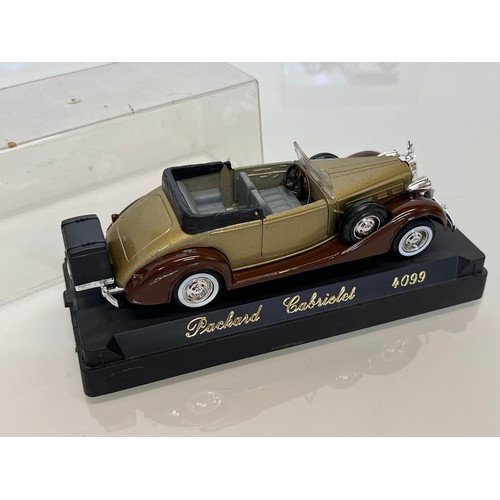 452 - A collection of nine cased Solido diecast models of grand motor cars from the 1920’s and 30’s, Rolls... 