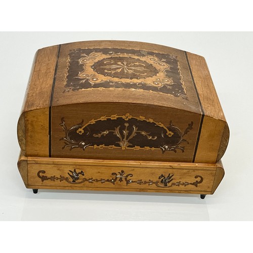 457 - An inlaid  musical jewellery box with mirrored interior and ballerinas inside.

This lot is avaialbl... 