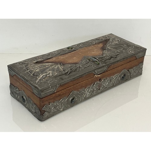 459 - A wooden box with metal bindings decorated with Caboshons, Dragons and embossed flowers. 

This lot ... 