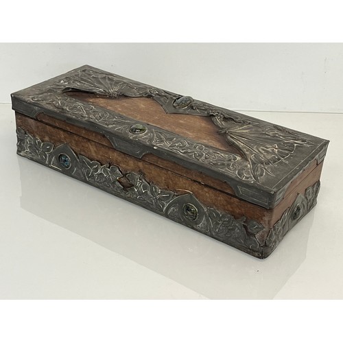 459 - A wooden box with metal bindings decorated with Caboshons, Dragons and embossed flowers. 

This lot ... 