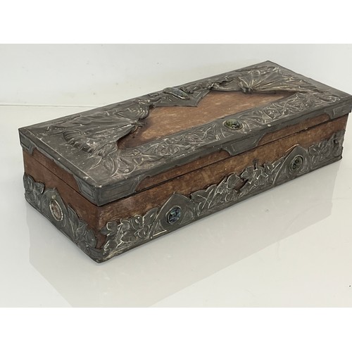 459 - A wooden box with metal bindings decorated with Caboshons, Dragons and embossed flowers. 

This lot ... 