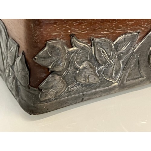 459 - A wooden box with metal bindings decorated with Caboshons, Dragons and embossed flowers. 

This lot ... 