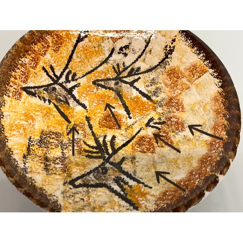 465 - Studio art pottery dish decorated with cave like drawings of deer, 26 cm x 5cm deep.

This lot is av... 