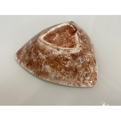 466 - Art pottery triangular shaped dish marked GS to the base, 24 cm and 7 cm deep

This lot is available... 