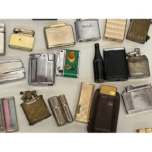 486 - A collection of pocket and table cigarette lighters some in original packaging, 44 in all.

This lot... 