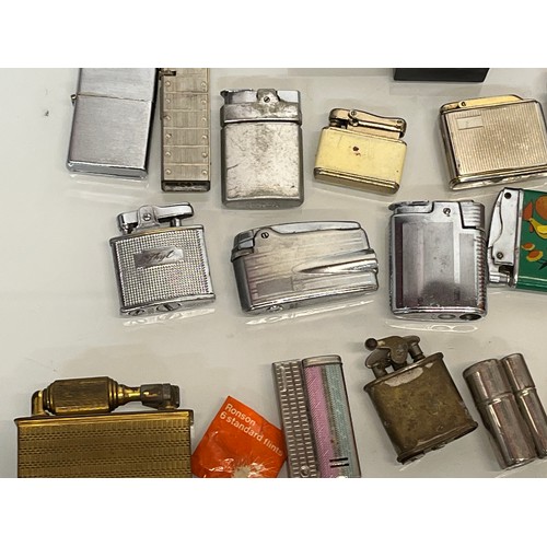 486 - A collection of pocket and table cigarette lighters some in original packaging, 44 in all.

This lot... 