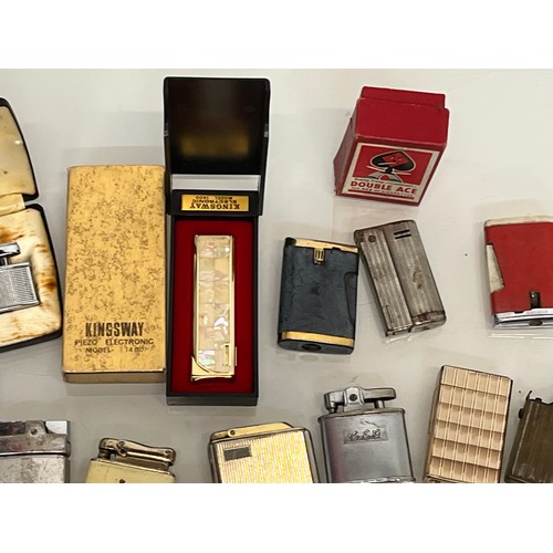 486 - A collection of pocket and table cigarette lighters some in original packaging, 44 in all.

This lot... 