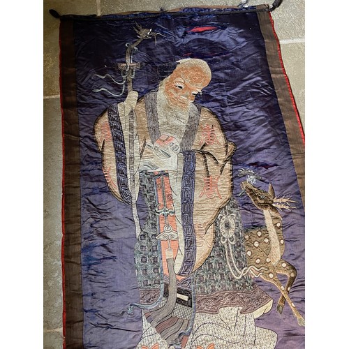 43 - Embroidered oriental wall hanging of Juojin one of the seven Gods of Fortune he represents longevity... 