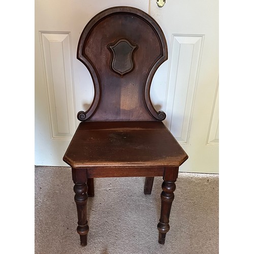 122 - A shield backed hall chair with turned front legs.

This lot is collection only