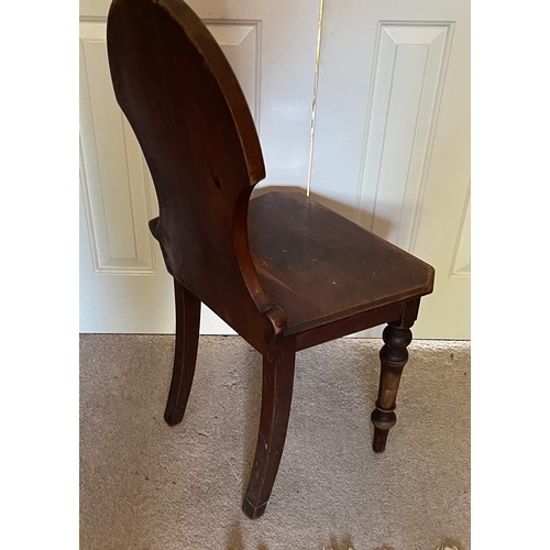 122 - A shield backed hall chair with turned front legs.

This lot is collection only