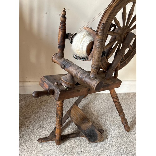 125 - Spinning wheel with an 84 cm diameter wheel.

This lot is collection only