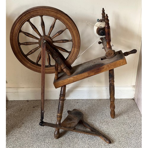 125 - Spinning wheel with an 84 cm diameter wheel.

This lot is collection only