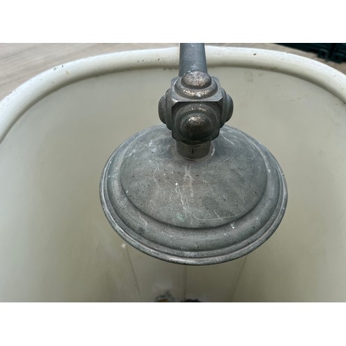 132 - Architectural salvage, cast iron bath fittings. Early C20th brass bathroom shower unit for a roll to... 