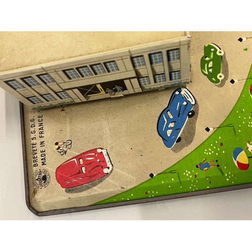 375 - Lithographed tinplate clock work model Airport with circling plane, in original box. 38 cm x 25 cm.
... 