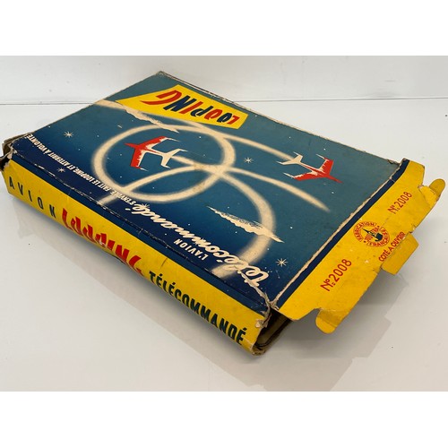 375 - Lithographed tinplate clock work model Airport with circling plane, in original box. 38 cm x 25 cm.
... 