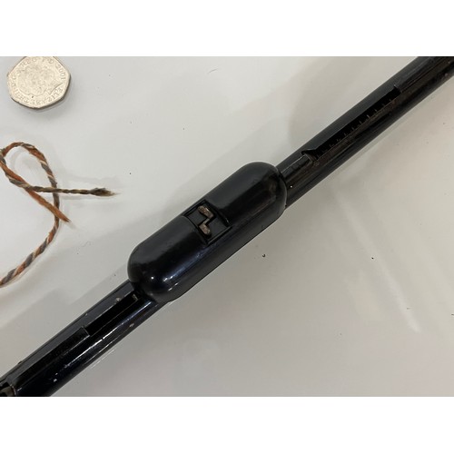 376 - A toy Pop Gun, a pump action reload mechanism aids rapid reloading, wooden butt and enamelled steel ... 