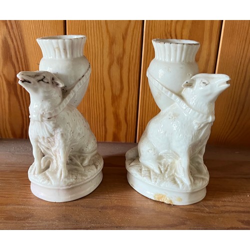 377 - A pair of pottery spill vases modelled as sheep.

This lot is available for in-house shipping