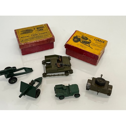173 - Two Boxed Britain military themed toys and three others.

This lot is available for in-house shippin... 