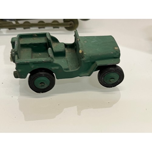 173 - Two Boxed Britain military themed toys and three others.

This lot is available for in-house shippin... 