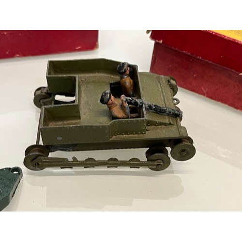 173 - Two Boxed Britain military themed toys and three others.

This lot is available for in-house shippin... 