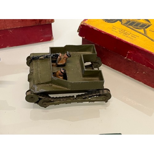 173 - Two Boxed Britain military themed toys and three others.

This lot is available for in-house shippin... 