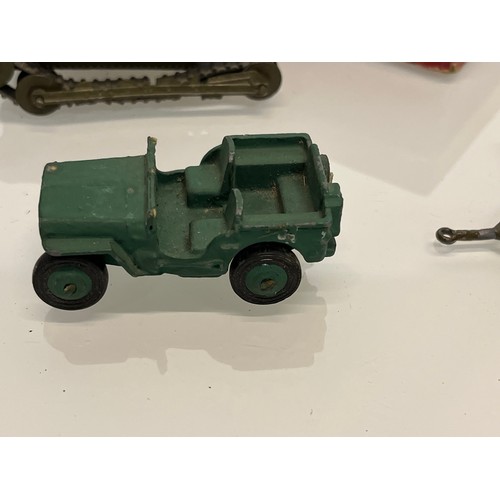 173 - Two Boxed Britain military themed toys and three others.

This lot is available for in-house shippin... 