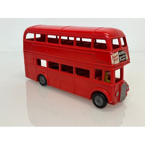 180 - Two diecast Matchbox toy buses and a large plastic Mettoy model of a London Routemaster Bus. 

This ... 