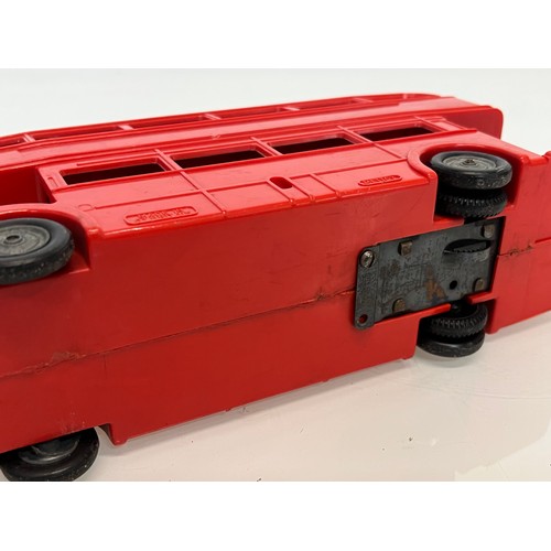 180 - Two diecast Matchbox toy buses and a large plastic Mettoy model of a London Routemaster Bus. 

This ... 