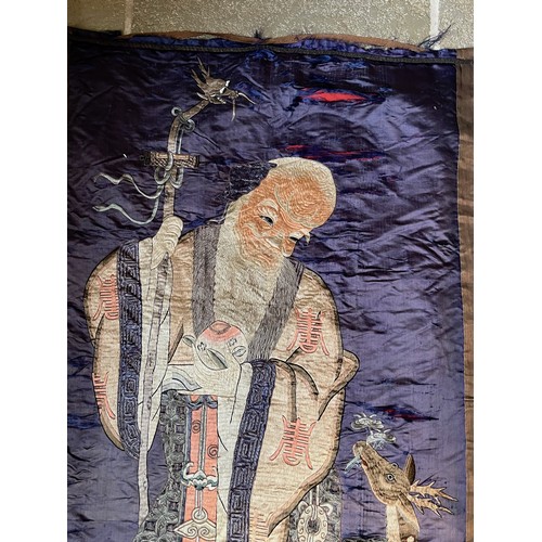127 - Embroidered oriental wall hanging of Juojin one of the seven Gods of Fortune he represents longevity... 