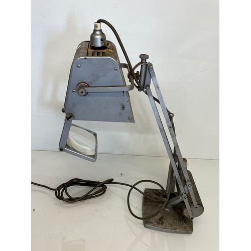 290 - Mid Century designer industrial lighting, a Hadrill Horstman work lamp with foldaway magnifier.

Thi... 