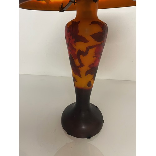 293 - Decorative C20th lighting, a coloured glass French art nouveau table lamp with floral decoration.  5... 