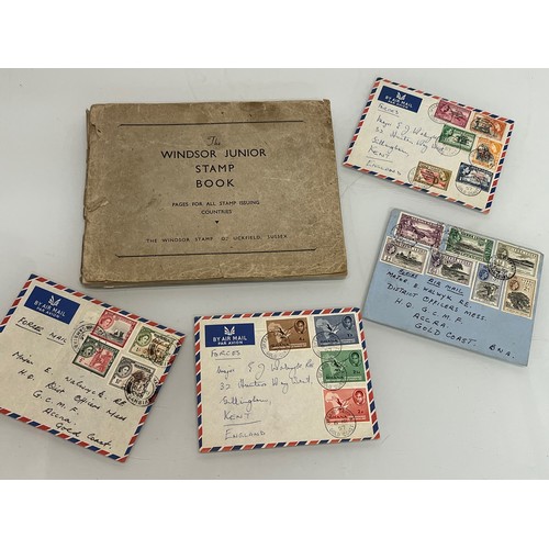 302 - A Windsor Junior Stamp album and some WWII military envelopes.

This lot is available for in-house s... 