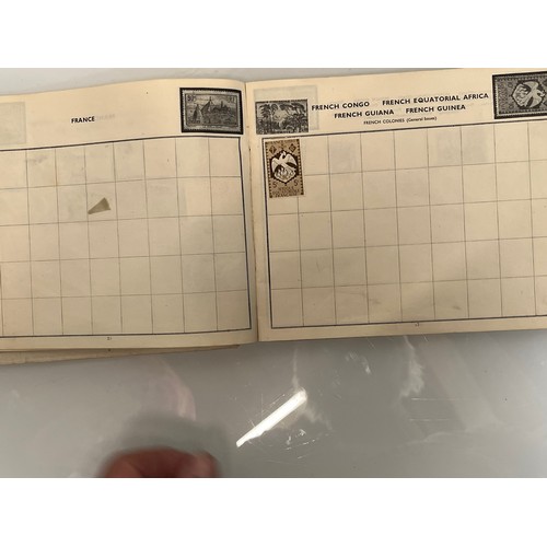 302 - A Windsor Junior Stamp album and some WWII military envelopes.

This lot is available for in-house s... 