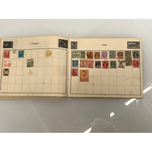 302 - A Windsor Junior Stamp album and some WWII military envelopes.

This lot is available for in-house s... 