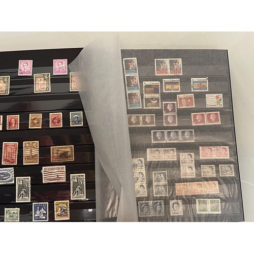 303 - Stamps an album featuring a collection of World stamps..

This lot is available for in-house shippin... 