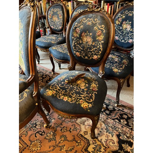 27 - Eight Victorian upholstered salon chairs with tapestry upholstered seats and back with applied ormol... 