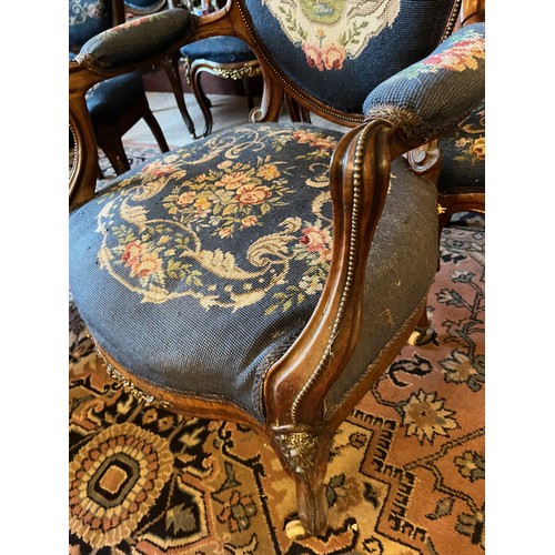27 - Eight Victorian upholstered salon chairs with tapestry upholstered seats and back with applied ormol... 