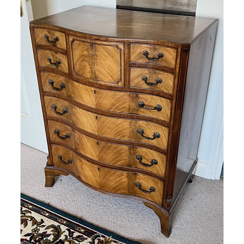 29 - Edwardian chest of eight drawers with a serpentine front.

This lot is collection only