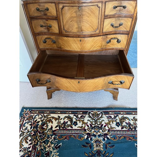 29 - Edwardian chest of eight drawers with a serpentine front.

This lot is collection only