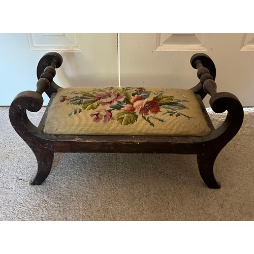 37 - An upholstered foot stool with a floral tapestry top. 46 cm x 24 cm x 24 cm high.

This lot is avail... 