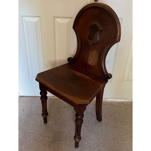40 - A shield backed hall chair with turned front legs.

This lot is collection only