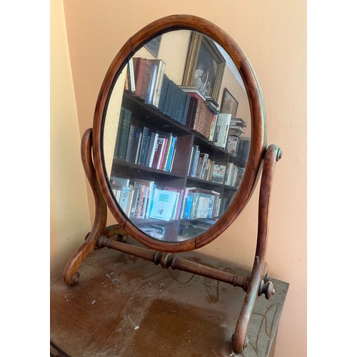 44 - Victorian dressing table mirror in an oval frame, 68 cm high x 47 cm wide  x 28 cm deep.

This lot i... 