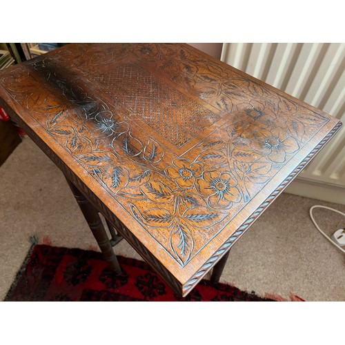 45 - Decorative furniture, a hand carved oak topped side table, 50 cm x 36 cm x 54 cm high.

This lot is ... 