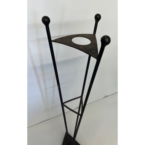 47 - A large modern blacksmith made wrought iron fireside companion set on stand.

This lot is available ... 