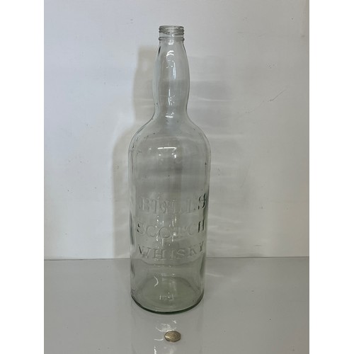 394 - Large Bells Scotch Whisky bottle. 49 cm tall.

This lot is available for in-house shipping