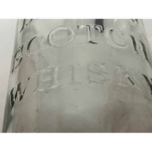 394 - Large Bells Scotch Whisky bottle. 49 cm tall.

This lot is available for in-house shipping