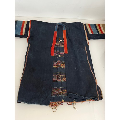 396 - Asian tribal art, an unusual antique jacket from a Hill tribe in Thailand, woven woollen body with d... 