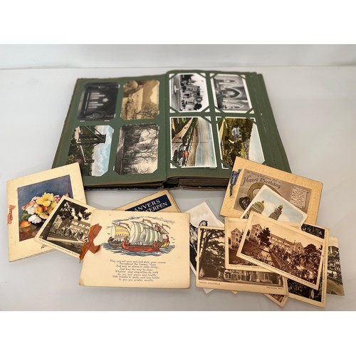 398 - A family collection of over 300 mostly early C20th postcards in a large album and additional loose e... 