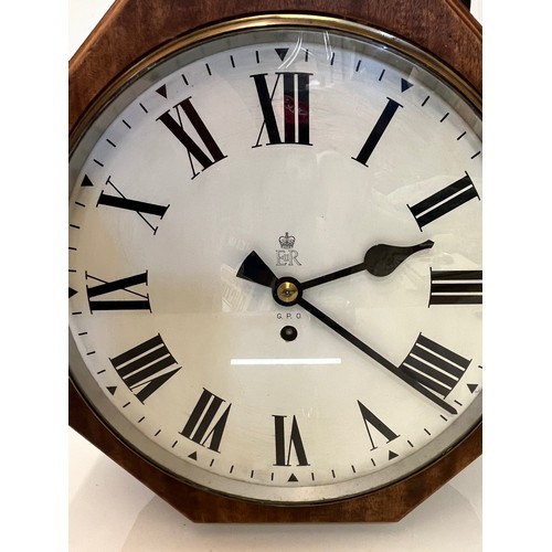 1 - A 12 inch double sided GPO hanging clock with a fusee movement. Features a fully serviced and cleane... 