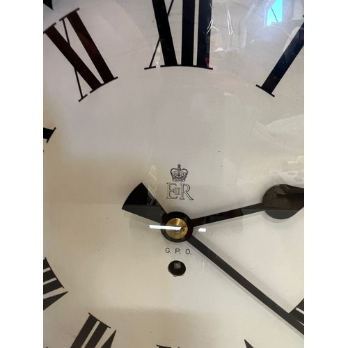 1 - A 12 inch double sided GPO hanging clock with a fusee movement. Features a fully serviced and cleane... 
